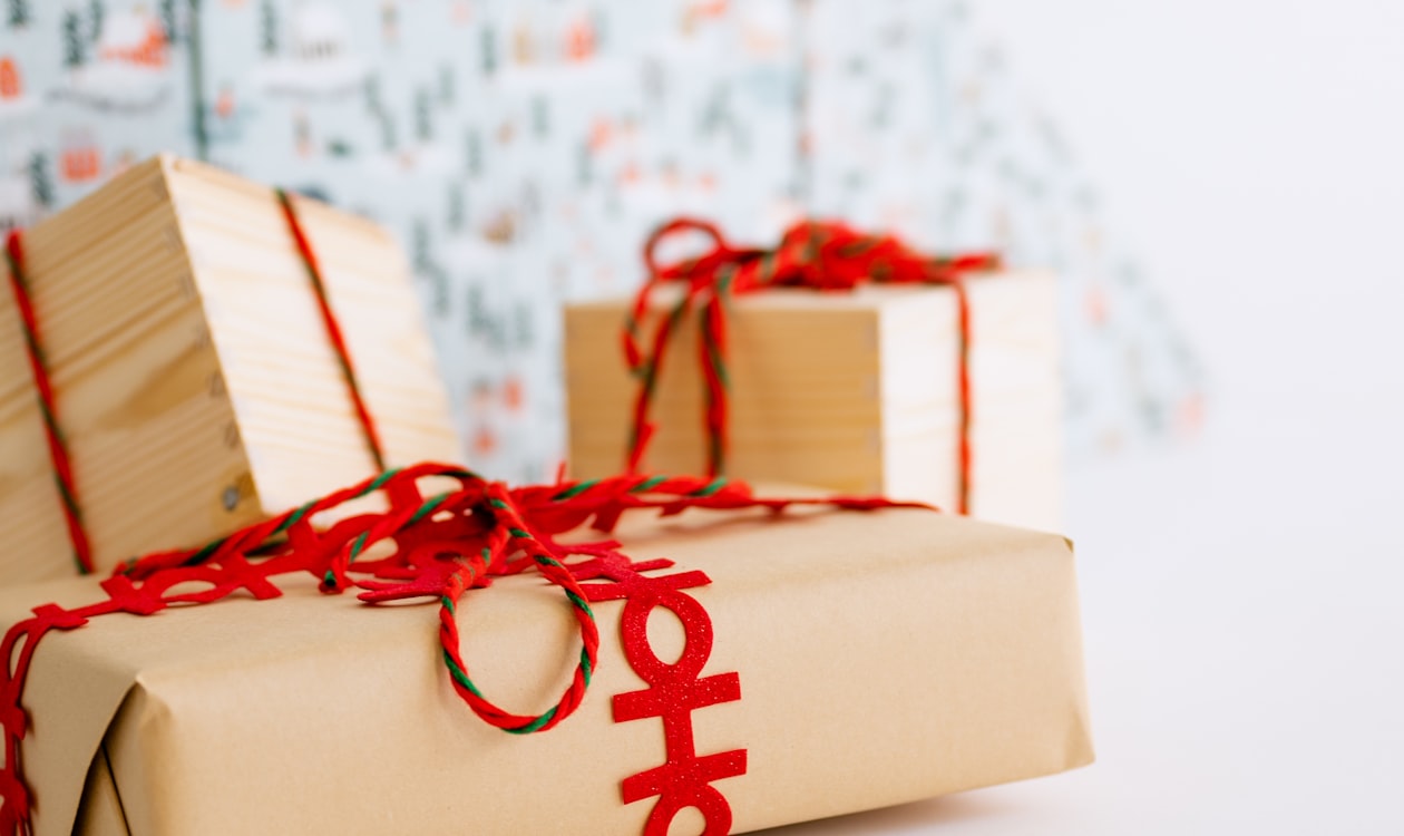 Sophisticated black gift box with red ribbon — premium corporate gift packaging for business gifting in Singapore and APAC